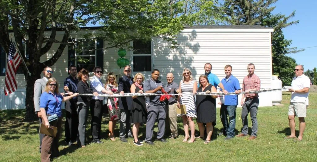 Ribbon cutting ceremony at new building